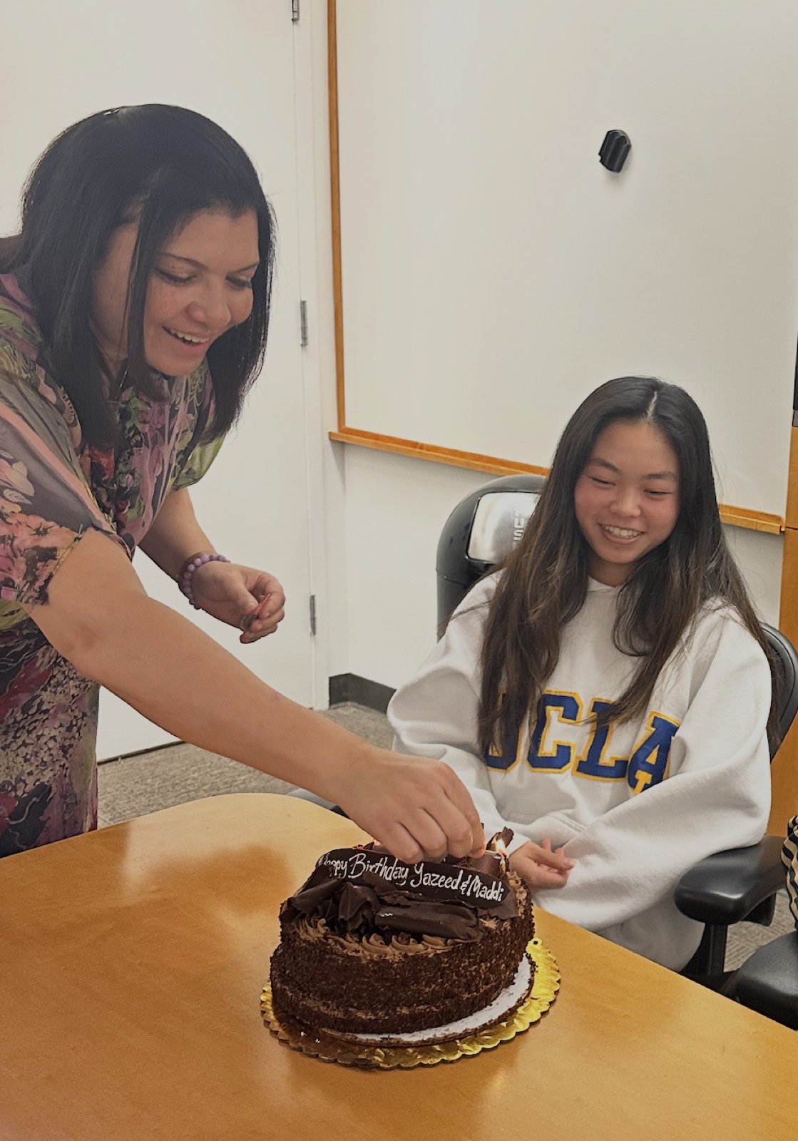 Cutting a birthday cake in the lab